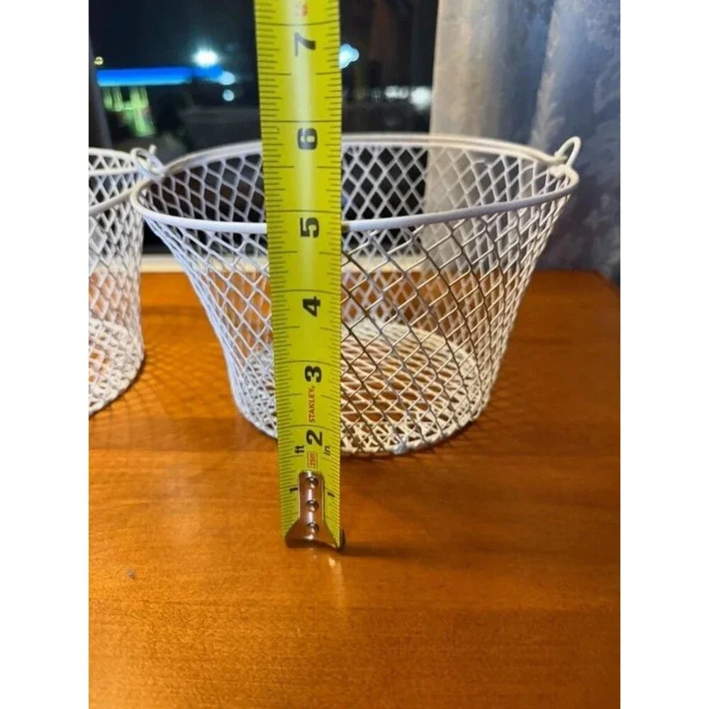 White wire mesh baskets with handles